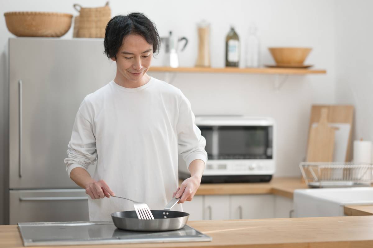 料理する人