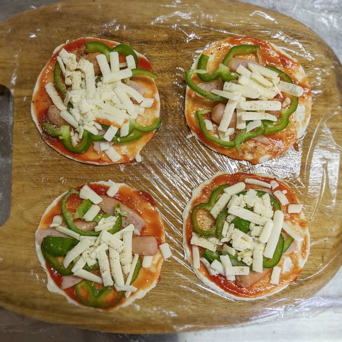 JAグループ公式の「パリッとひとくち！餃子の皮でアレンジチーズピザ」のレシピ