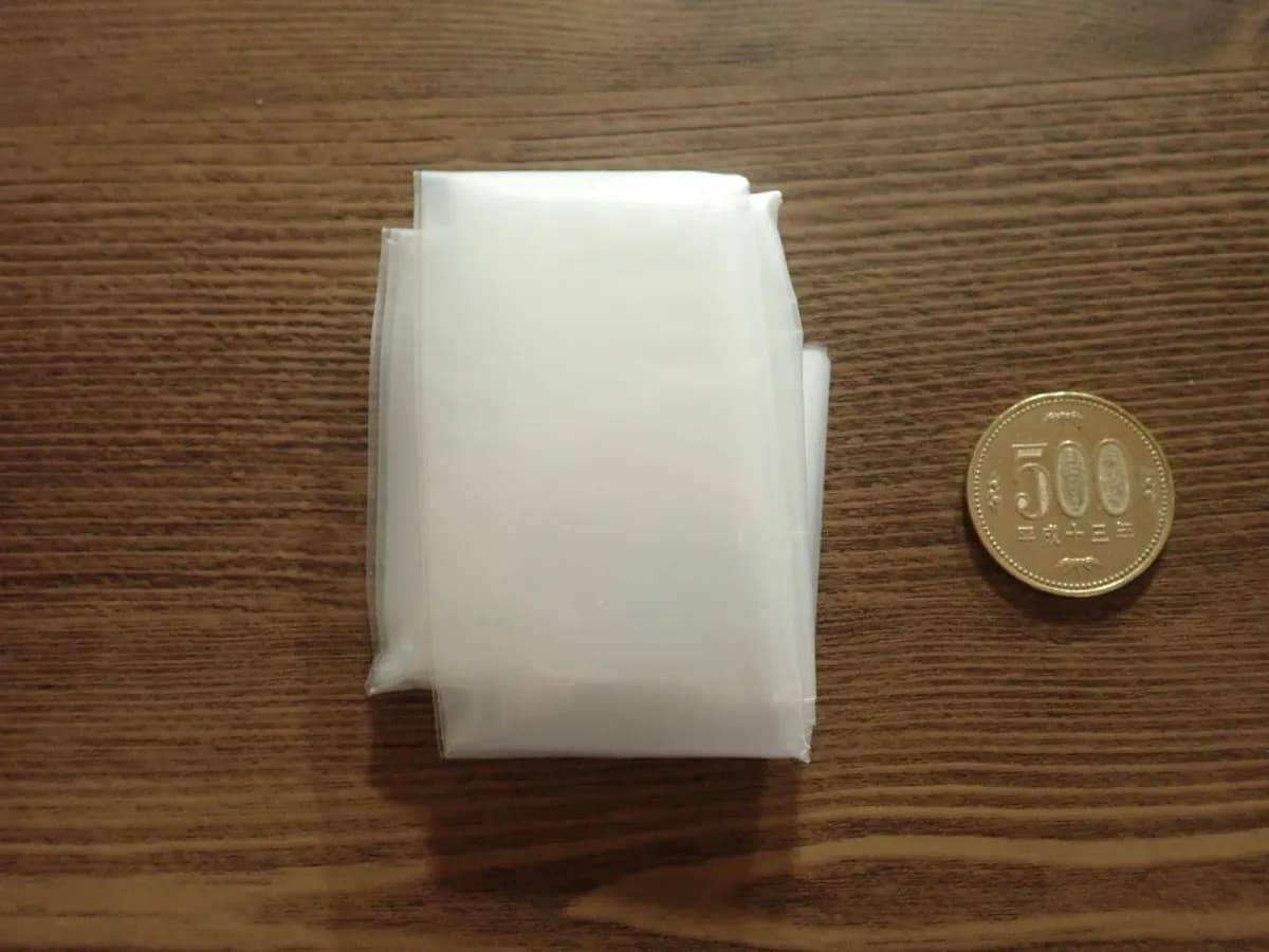 ダイソー携帯用簡易レインバッグカバー(トートバッグ用)−２