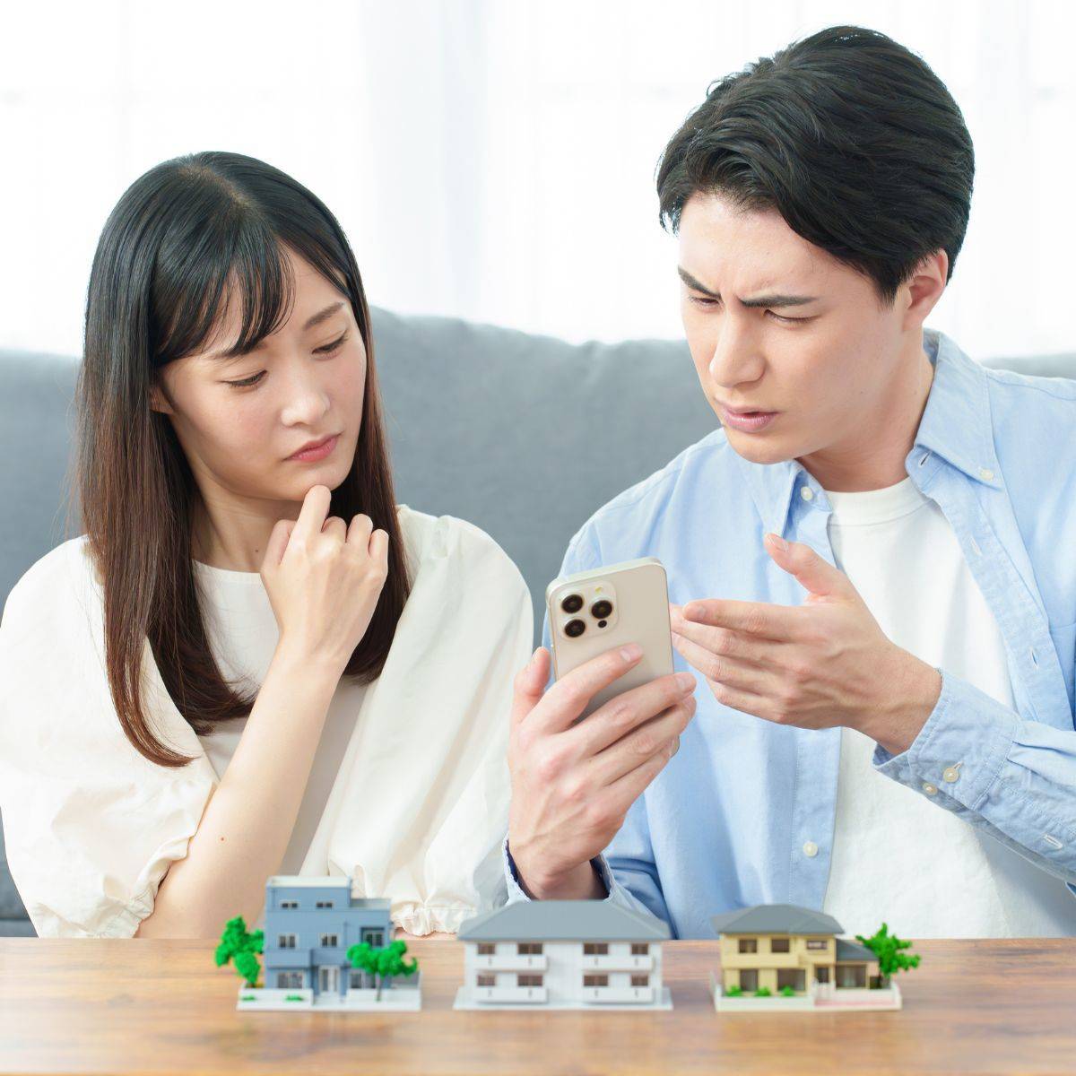 不動産に悩む夫婦