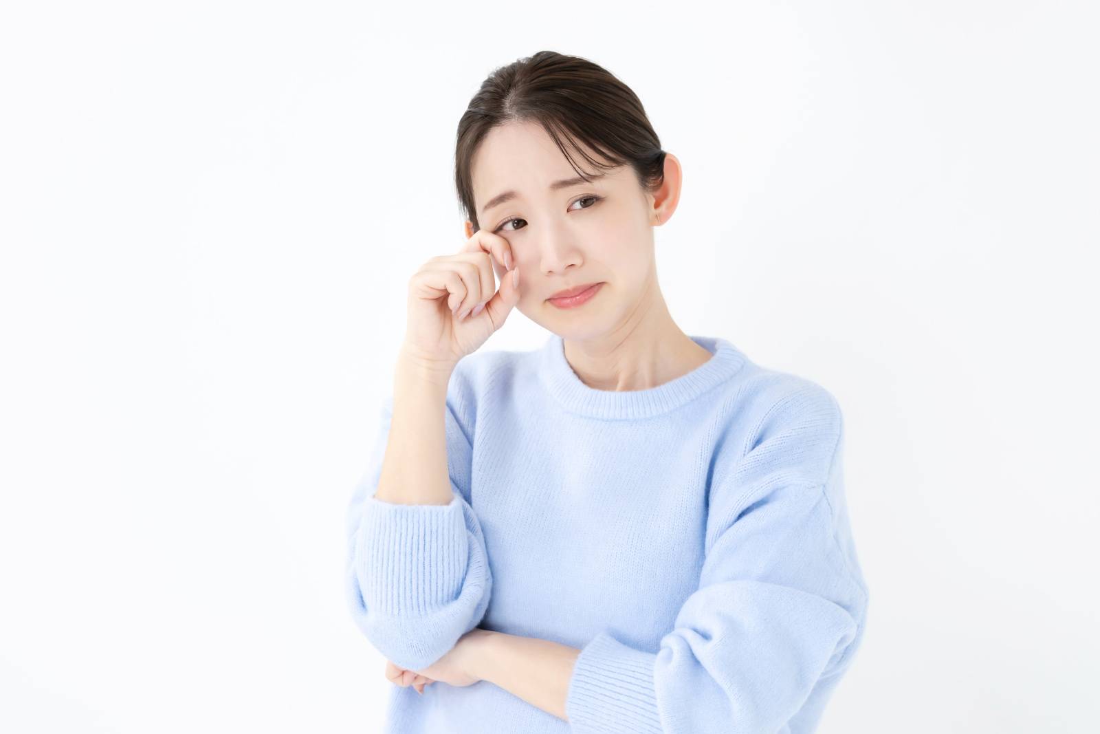 悲しむ女性