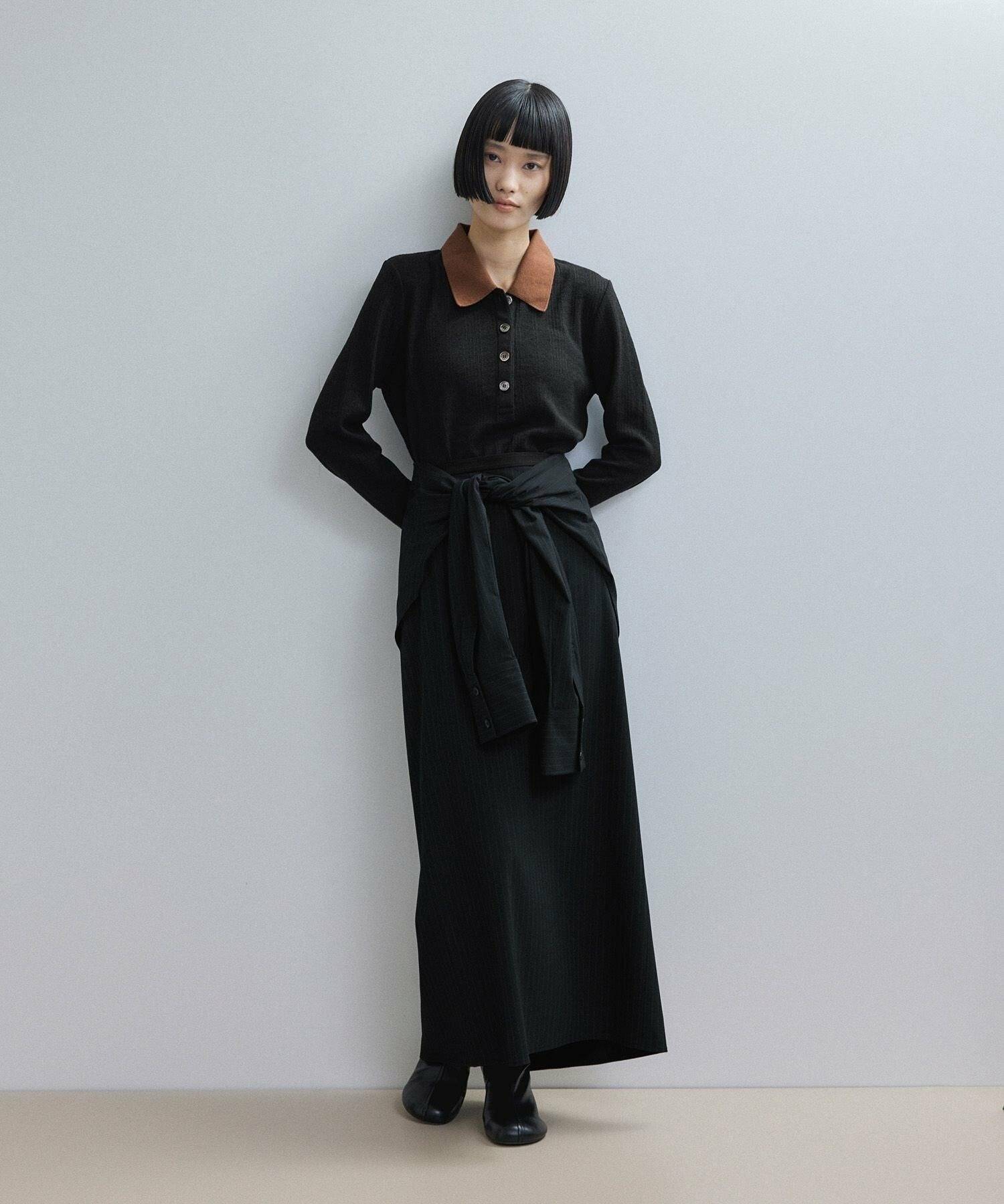 黒ポロシャツのレディースコーデ