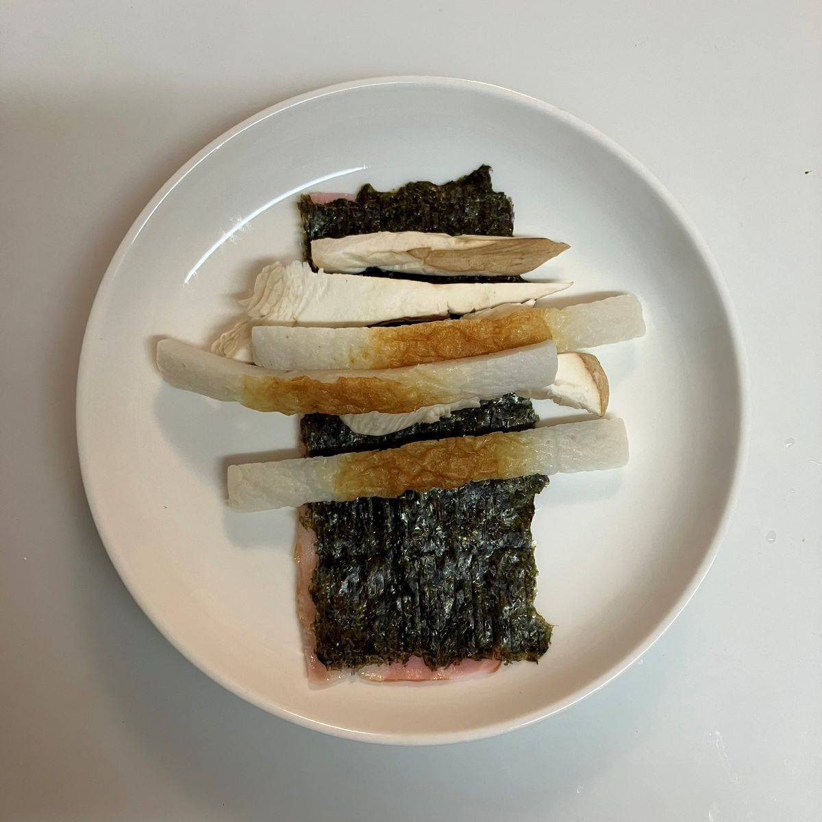 ニッスイ公式の「活ちくわとエリンギのベーコン巻き」のレシピ