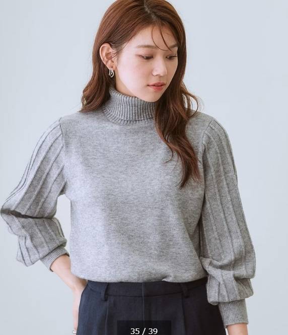 ニッセン プリーツ風柄ボリューム袖タートルネックニット