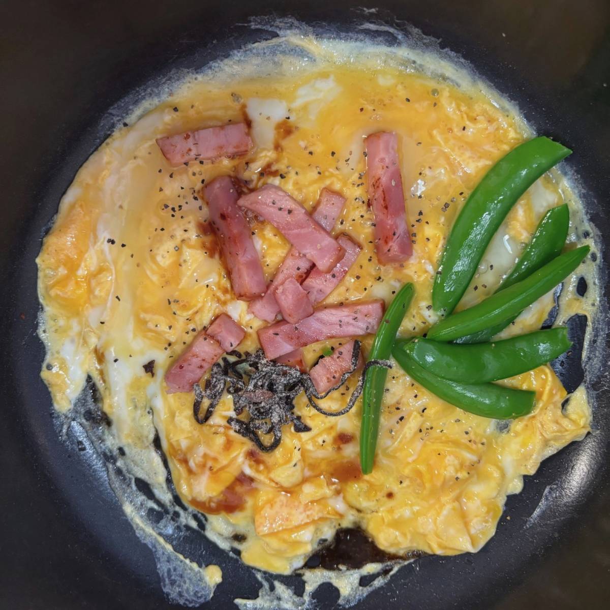 JA全農公式の「スナップエンドウとたまごの塩昆布炒め」のレシピ