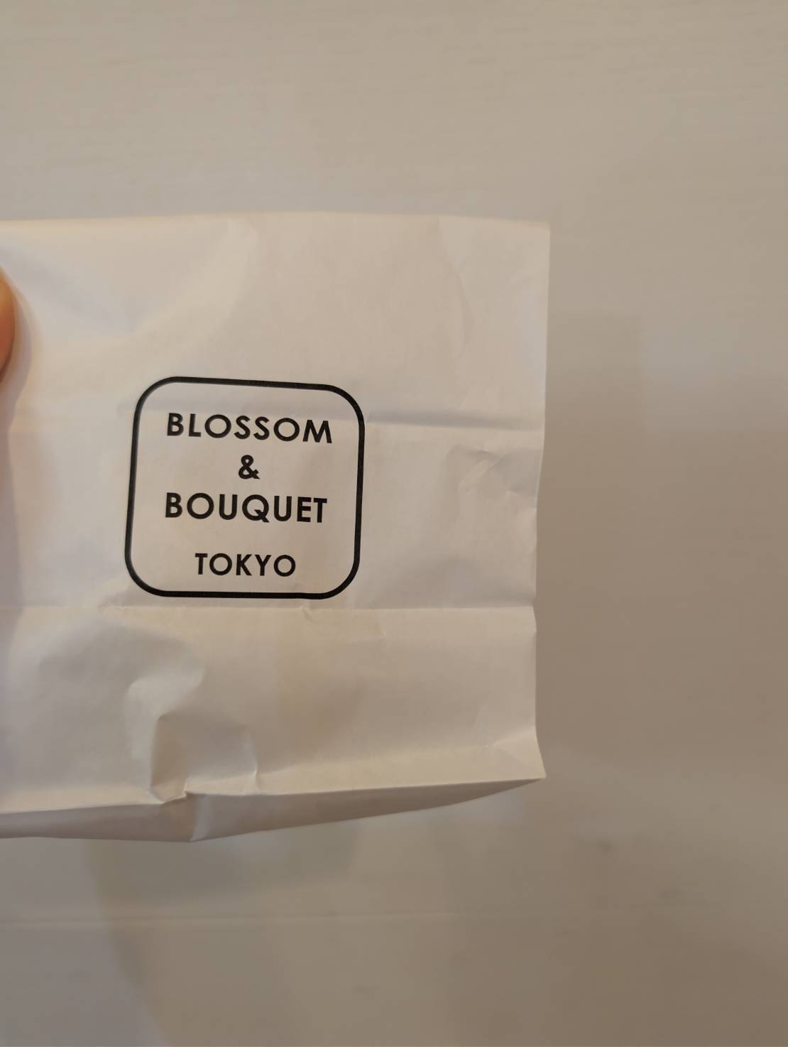 BLOSSOM & BOUQUET TOKYO イイトルミネ新宿店の紙袋