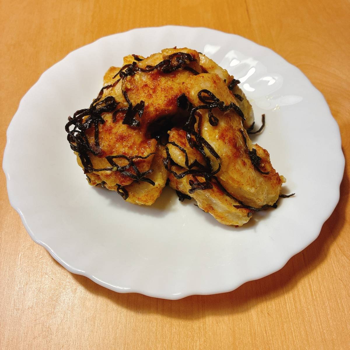 くらこん公式の「塩こんぶと豚肉のカレー炒め」のレシピ