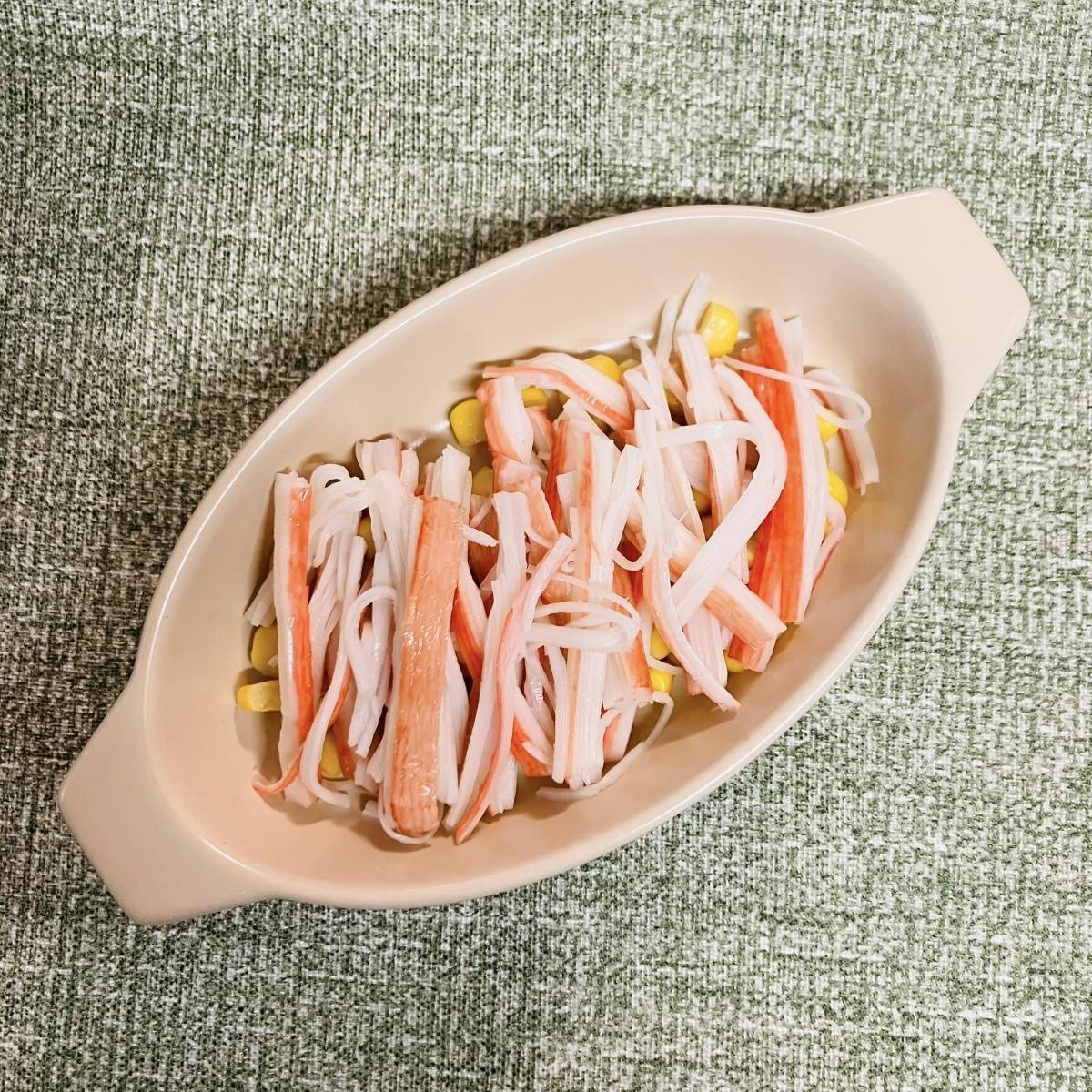 いちまさ公式の「お弁当に！カニかまカップグラタン風」のレシピ