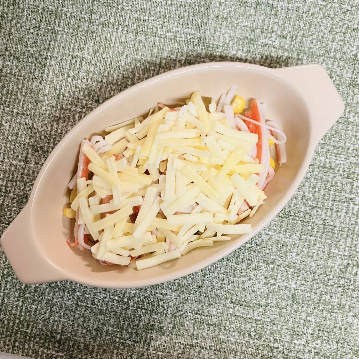 いちまさ公式の「お弁当に！カニかまカップグラタン風」のレシピ